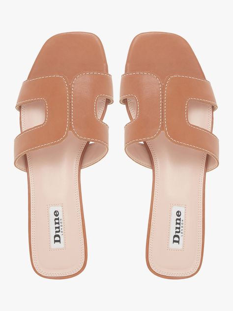 Stay smart and stylish this summer with Dune's Loupe slider sandal. Featuring a cut out design with contrast stitching and a low block heel. An open sandal toe and resin sole complete the striking shoe. Heel height: 0.5cm Wide Leg Linen Trousers, Nice Sandals, Slider Sandals, Sandal Online, Womens Sandals Summer, Leather Cuts, Stylish Sandals, Buy Shoes Online, Dune London