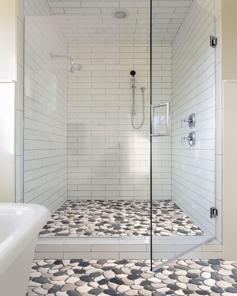 When it comes to the pebbly bathroom tile, it’s considered the best tile for shower floor exactly because of its textured anti-slip traction and naturalistic, tropical beach or “coastal” feel. Pebble Shower Floor, Pebble Floor, Shower Floor Tile, Pebble Tile, Master Shower, Bathroom Remodels, Bathroom Shower Tile, Bathroom Remodel Shower, Shower Remodel