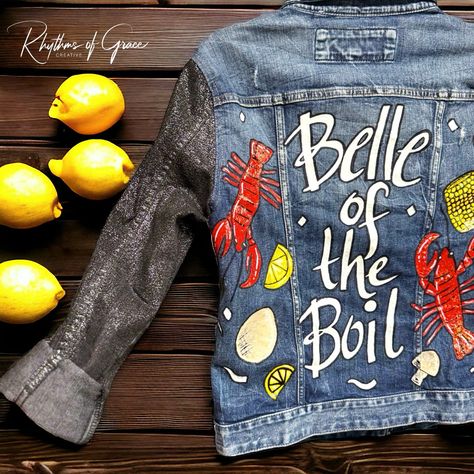 Hand-Painted Mardi Gras Jean Jacket: “Belle Of The Boil” - One Of A Kind! Introducing The Newest Addition To Our Collection: The "Belle Of The Boil" Hand-Painted Jean Jacket! Perfect For This Year's Family Crawfish Boil, This Unique, Eye-Catching Piece Will Ensure You Stand Out With Style And Flair At Any Event. Limited Stock Available, So Grab Yours Now And Be Ready To Rock The Crawfish Boil In Style! Features: - Size: Ladies Small - Brand: Express Denim Jacket - Details: Complete With All The Mardi Gras Jean Jacket, Denim Painting, Denim Paint, Painted Jean Jacket, Oyster Roast, Painted Things, Hand Painted Denim Jacket, Painted Fabric, Hand Painted Clothing