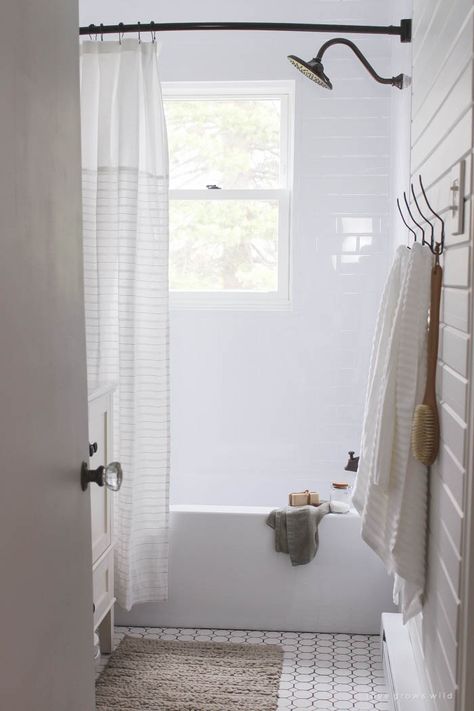 See the big reveal of this beautiful farmhouse bathroom makeover! Click for before and after photos and details at LoveGrowsWild.com Bath Fitter, Deep Clean Bathroom, White Bathroom Designs, House Bathrooms, Makeover Before And After, Towel Racks, Upstairs Bathrooms, Trendy Bathroom, Bathroom Redo