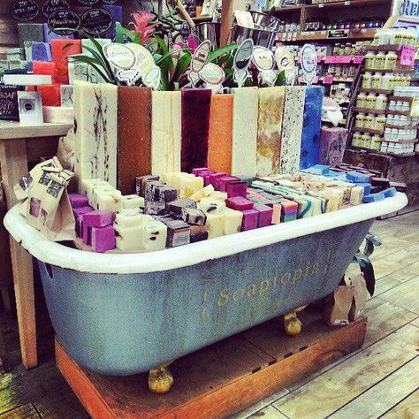 Using an old bathtub to display soap. Soaptopia.                                                                                                                                                     More Modern Farmhouse Store Display, Retail Store Layout, Gift Shop Displays, Old Bathtub, Soap Display, Soap Making Kits, Craft Fair Displays, Store Layout, Soap Shop