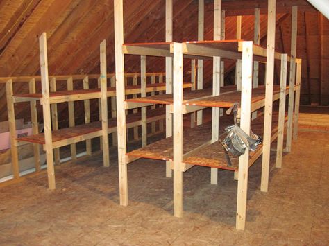 Attic Shelving | The large attic is perfect for storage of a… | Flickr Attic Shelving Ideas, Attic Shelving Slanted Walls, Attic Shelves Slanted Walls, Attic Shelving, Attic Storage Ideas, Attic Storage Organization, Unfinished Attic, Attic Organization, Attic Shelves