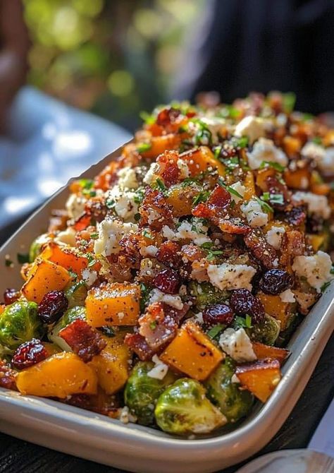 🌿 Roasted Brussels Sprouts and Butternut Squash with Bacon, Cranberries, and Goat Cheese 🌿

This savory-sweet side dish is packed with caramelized Brussels sprouts and butternut squash, complemented by crispy bacon, tart cranberries, and creamy goat cheese. It’s a festive addition to any fall or winter meal!

Ingredients:

1 lb Brussels sprouts, trimmed and halved
3 cups butternut squash, peeled and diced into 1-inch cubes
2 tablespoons olive oil
Salt and pepper, to taste
½ teaspoon cinnamon (optional, for added warmth)
4 slices bacon, chopped
⅓ cup dried cranberries
⅓ cup crumbled goat cheese

Instructions:

Step 1: Prepare and Roast the Vegetables
• Preheat the oven to 400°F (200°C).
• Season and coat the Brussels sprouts and butternut squash with olive oil, salt, pepper, and cinnamon Butternut Squash With Bacon, Stanley Tucci Recipes, Tucci Recipes, Brussels Sprouts And Butternut Squash, Butternut Squash Side Dish, Butternut Squash Bacon, Mediterranean Vegetables, Gordon Ramsay Recipe, Pomegranate Recipes