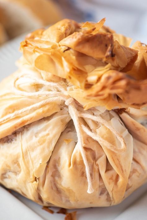 Baked phyllo dough wrapped around brie cheese, tied with kitchen twine Phylo Pastry Recipes, Easy Sausage Casserole, Philo Dough, Brie Cheese Recipes, Phyllo Dough Recipes, Turkey And Stuffing, Phyllo Recipes, Bread Stuffing, Turkey Cranberry