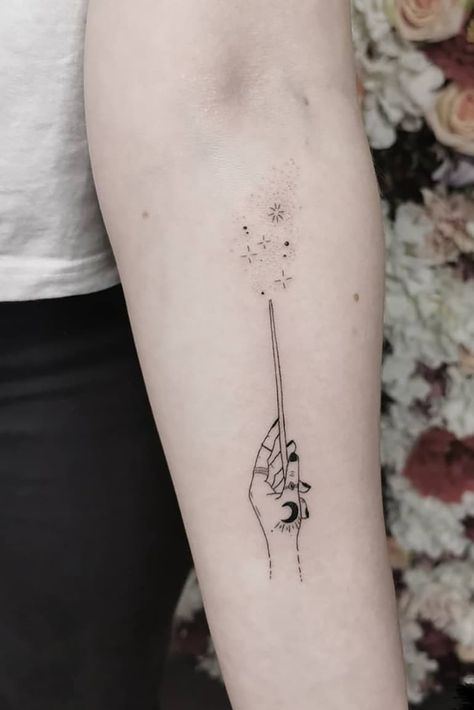 25 Great Halloween Tattoo Art Ideas to Make You Enjoy The Holiday Atmosphere All Year Witch Magic Tattoo, Magic Wand Finger Tattoo, Witch Wand Tattoo, Magic Dust Tattoo, You Are Magic Tattoo, Magic Stick Tattoo, Fairy Wand Tattoo, Harry Potter Wand Tattoos, Wand Tattoo Ideas