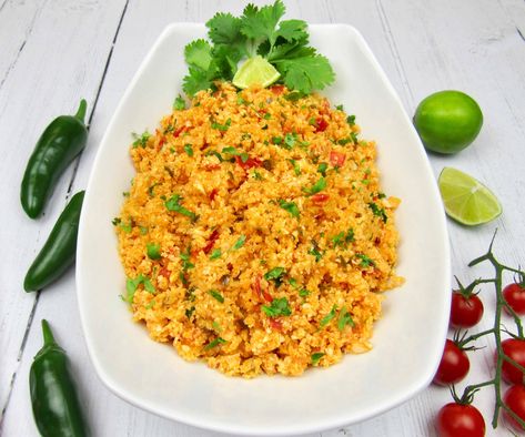 Mexican Cauliflower Rice - Keto and Low Carb Cauliflower rice gets a boost of flavor with a Mexican flair!  This easy to make Low Carb side dish can be served in under 15 minutes.  Perfect to serve in a burrito bowl, on the side of tacos or pork carnitas! #ketomexicancauliflower #cauliflowerrice #lowcarbsides Cauliflower Rice Mexican Bowl, Keto Mexican Rice, Keto Rice, Mexican Keto, Mexican Cauliflower Rice, Mexican Cauliflower, Cauliflower Side Dish, Low Carb Side Dish, Taco Side Dishes