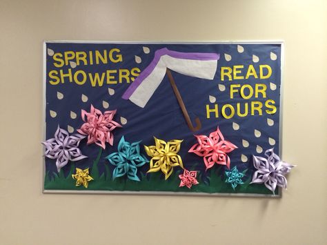 Spring Showers Read for Hours. Spring bulletin board. Library/reading board. April Showers Read For Hours Bulletin Board, Spring Into Reading Bulletin Board, Spring Into A Good Book Bulletin Board, April Library Display Ideas, March Reading Bulletin Board Ideas, Easter Library Bulletin Boards, March Is Reading Month Bulletin Board, April Library Bulletin Boards, Library Spring Bulletin Boards