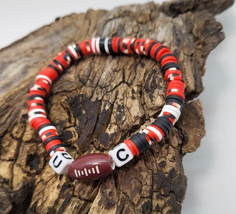 Red Beaded Heishi Beads Jewelry, Adjustable Red Heishi Beads Stretch Bracelet, Red And White Clay Bead Bracelet, Red Black And White Clay Bead Bracelet, Red Heishi Beads, Malachite Earrings, Black Clay, Heishi Beads, Stretchy Bracelets