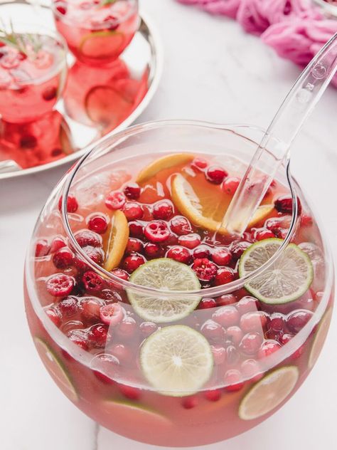 A punch bowl with a tray of drinks next to it. Punch With Cranberry Juice, Cranberry Juice Pineapple Juice, Mexican Punch, Sangria Party, Sparkling Punch, Cranberry Cider, Cranberry Punch, Holiday Hacks, Sherbet Punch