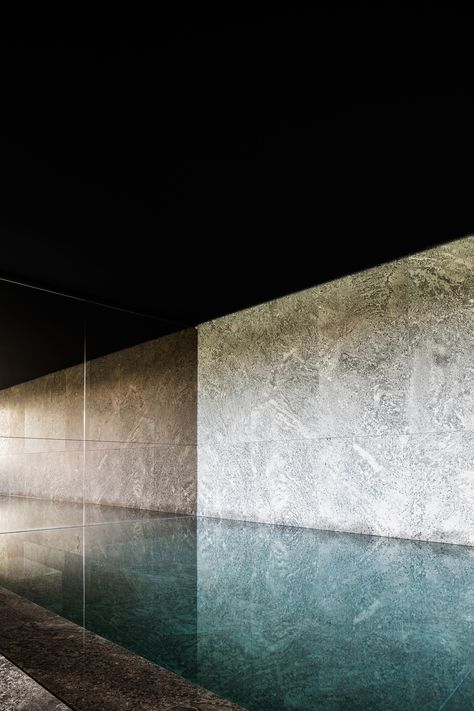 This mesmerizing pool inside a private spa by Britsom & Philips in Gent, Belgium, features a wall and basin made of Muschelkalk marble from Germany. Swimming Pool Wall Design, Indoor Pool Ideas, Architecture Visualization Photoshop, Minimal Livingroom, Marble Pool, Spa Vibes, Pool Indoor, Inside Pool, Marble Mirror