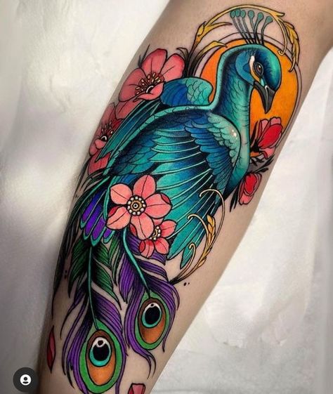 Peacock Tattoo- Meaning and Images. Neo Traditional Tattoo Sleeve Woman, Peacock Arm Sleeve Tattoo, Colorful Peacock Tattoo, Color Peacock Tattoo, Neotraditional Peacock Tattoo Design, Peacock Tattoo Neo Traditional, Peacock Tattoo With Flowers, Peacock Tattoo Forearm, Old School Peacock Tattoo