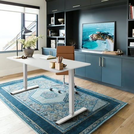 This Homall height adjustable standing desk helps create a comfortable home office environment. Our electric height adjustable desks come with availability in a wide range of colors and sizes, allowing you to find the most suitable one for home and living scenario.The stable adjustable height and the 2-position memory height function provides you with a comfortable office experience. Plus, the easy and user-friendly installation helps with getting started using this brilliant height adjustable s Standing Work Desk, Moveable Desk Ideas, Office With Adjustable Desk, Standing Desk Home Office, Office 2023, Adjustable Desks, Attic Office, Standing Desk Office, Home Office Computer Desk