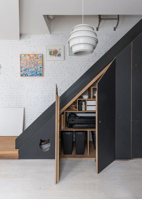 Pendant light by Alvar Aalto. Interior design and under-stair storage by Studio Nous and Oliver Valle Office of Brooklyn. From Brownstoner. Stair Nook, تحت الدرج, Stairs Renovation, Stairs Makeover, Staircase Storage, Under Stairs Cupboard, Under The Stairs, Basement Stairs, Diy Stairs