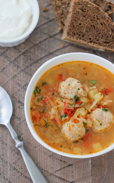 Shchi (Russian Cabbage Soup) With Meatballs - Olga's Flavor Factory Olgas Flavor Factory, Russian Cabbage Soup Recipe, Russian Cabbage Soup, Cabbage Soup Crockpot, Soup With Meatballs, Creamed Cabbage, Russian Foods, Cabbage Soup Diet Recipe, Cabbage Soup Recipe