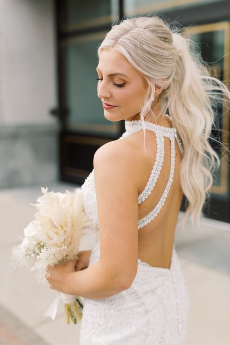 Bride Hair High Ponytail, High Neck Dress Updo Hairstyles, Wedding Hair For Bride Ponytail, Updo Wedding Hair Ponytail, High Ponytail Hairstyles For Homecoming, Prom Curled Ponytail, High Neck Wedding Hairstyles, Hair For High Neck Dress Wedding, Tucked Sides Hairstyle