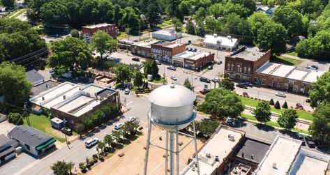 Downtown: Waxhaw | Our State Waxhaw North Carolina, Antique Grandfather Clock, Clock Shop, Antique Clock, Meet Friends, Local Farm, Grandfather Clock, Traffic Light, Tea Shop