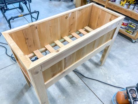 How to make a DIY raised planter box for about $50 in materials Diy Raised Planter, Planter With Trellis, Diy Wooden Planters, Jen Woodhouse, Creative Office Design, Cedar Fence Pickets, Planter Box With Trellis, Elevated Planter Box, Raised Planter Boxes