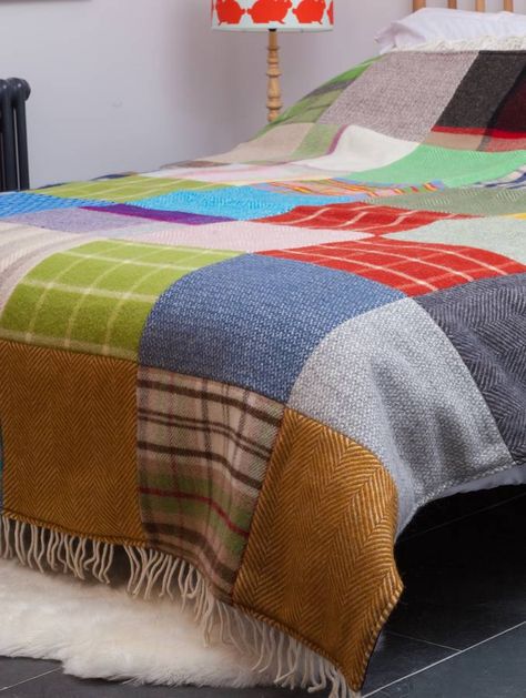 Stunning patchwork wool throw, with fringe detail, made in Britain; each one unique.Why we love it - This patchwork blanket is a real talking point for any room. Each one unique, it is a stunning addition to your home. Perfect for adding a colourful and rustic touch to farmhouse bedrooms and slouchy sofas, this patchwork blanket has been crafted right here in Britain from the finest wool. Why you'll love it - If you're a fan of the totally unique, this beautiful design is just the ticket. No ... Sweater Quilts, Blanket Pictures, Patch Blanket, Recycled Blankets, Sweater Quilt, Blanket Making, Farmhouse Bedrooms, Blanket Knitted, Recycled Sweaters