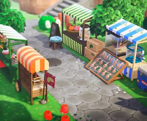 Animal Crossing Island Entry Ideas, Animal Crossing Booth Design, Acnh Island Set Up, Animal Crossing Square Ideas, Marketplace Animal Crossing, Anch Shopping Area, Animal Crossing Market Place Ideas, Acnh Phone Booth Ideas, Acnh Donation Box Design