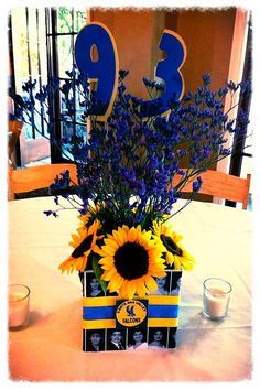 High School Reunion Table Decorations | High School Reunion Centerpiece Kids Graduation Party Ideas, 50th High School Reunion, High School Reunion Planning, Highschool Reunion, Fondue Ideas, School Reunion Decorations, 50th Class Reunion Ideas, Reunion Centerpieces, 10 Year Reunion