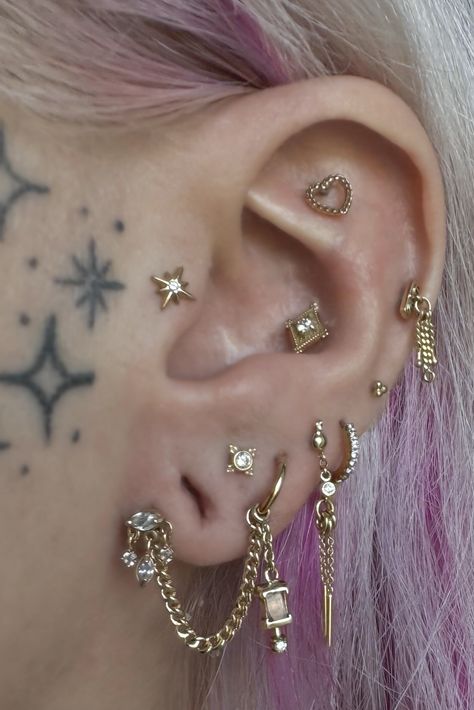 @adornedbyamelia wears: Sparklier Motion | Tragus⁠ Lucidity | Conch⁠ Heart In Chains | Flat No Masters | Helix Stargazer | Lower Lobe Cherish With Diamond | Mid Lobe @pupil.hall | Upper Lobe @bvla | Inner Lobe @hialeahfinejewelry | Chain  Get pierced by Amelia with brands you love at @scarecrowgalleriestattoo. (all on IG) Multiple Ear Lobe Piercings, Stacked Lobes Piercing, Multi Lobe Piercing, Lobe Earrings, Vertical Lobe Piercing, Inner Lobe Piercing, Vertical Stacked Lobe Ear Piercings, Stacked First Lobe Piercing, Jewellery Earrings