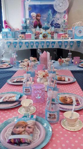 Pink and blue table at a Frozen birthday party! See more party ideas at CatchMyParty.com! Pink Elsa Birthday Party, Frozen Birthday Tea Party, Frozen Table Setting, Frozen Birthday Party Table Set Up, Pink Frozen Birthday Party, Frozen Birthday Table Decorations, Frozen Tea Party Birthday, Pink Silverware, Frozen Tea Party