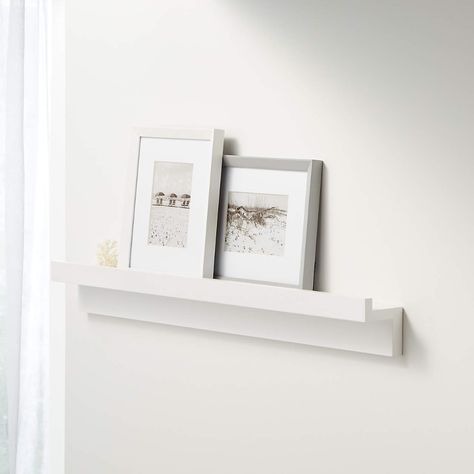 Carren 36" Floating White Ledge Shelf with Lip + Reviews | Crate and Barrel Shelf With Lip, Photo Ledge, Small Living Room Furniture, Art Loft, Ledge Shelf, Display Family Photos, Mirrored Picture Frames, Picture Ledge, White Picture Frames