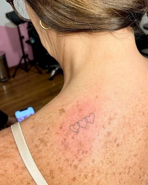 Three little hearts tttooed on the upper back, fine Hearts Tattoo Designs, Three Hearts Tattoo, Sister Heart Tattoos, Three Sister Tattoos, 3 Hearts Tattoo, Little Heart Tattoos, Love Heart Tattoo, Hearts Tattoo, Small Heart Tattoos