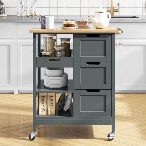 This kitchen serving cart offers extra storage space to hold kitchen utensils, and prepared food; you can also easily move around the kitchen, dining room, or garden to enjoy mealtime or teatime with family and friends.FeaturesStable Structure: Thick pine wood top on 4 sturdy legs & P2 grade MDF can support weight up to 300lbs without shaking; painted in smooth food-safe finish makes them waterproof and scratch-proof for easy cleaning and food preparation.Large Storage Space: The wide top of Rolling Kitchen Cart, Island Cart, Kitchen Trolley, Kitchen Island Cart, Wood Kitchen Island, Serving Cart, Dining Room Storage, Drawer Shelves, Kitchen Roll