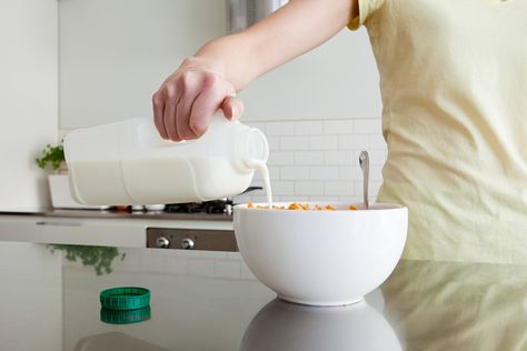 A woman is pouring milk onto cereal in this file photo. (Credit: Getty Images) Frugal Habits, Cold Cereal, Old Commercials, Bowl Of Cereal, Pink Milk, Fruity Pebbles, Skim Milk, Food Test, Quick And Easy Breakfast