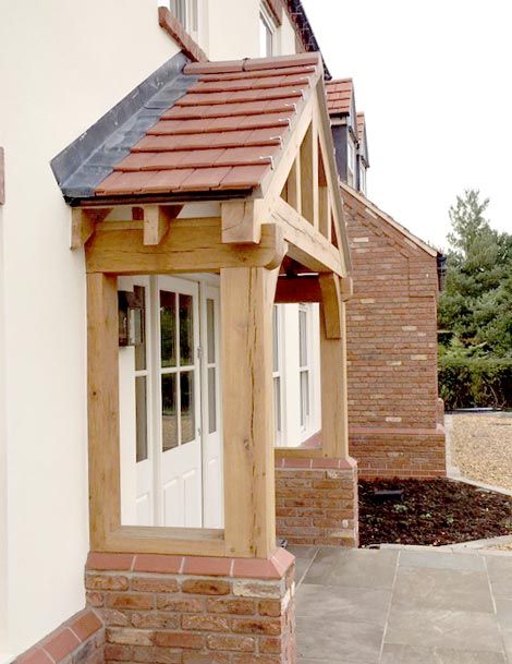 The beautiful oak porch gives the new build WOW factor Large Front Porch Ideas, Timber Porch, Gable Roof Porch, Oak Projects, Oak Porches, Porch Oak, Door Canopies, Oak Porch, Timber Frame Porch