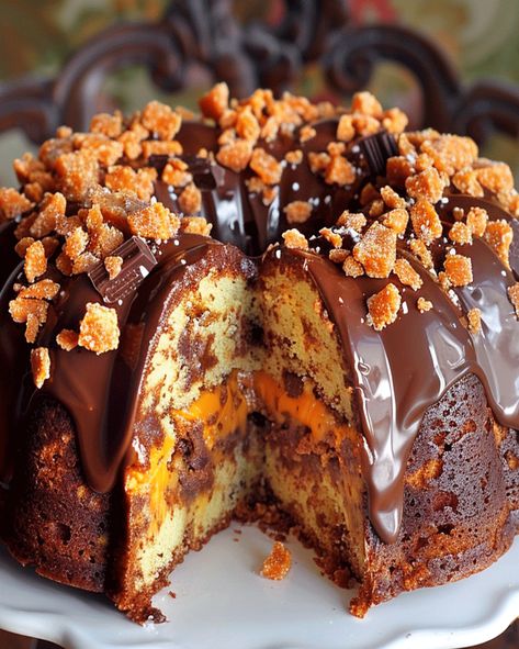 Discover how to make a Butterfinger Bundt Cake filled with caramel, chocolate chips, and topped with a rich drizzle for an irresistible dessert. Chocolate Cake Mix Bundt Cake Recipes, Bundt Cakes With Filling, Butterfinger Bundt Cake Recipe, Thanksgiving Bundt Cake Ideas, Butterfinger Bundt Cake, Senior Cakes, Turtle Bundt Cake, Peanut Butter Bundt Cake, Chocolate Bundt Cakes