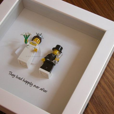 Art frame feature two LEGO®️️ minifigures, Bride and Groom with the a quote: ‘They lived happily ever after beneath. Its the perfect gift for Lego Wedding, Homemade Wedding Gifts, Wedding Gifts For Bride And Groom, Diy Wedding Gifts, Homemade Wedding, Lego Minifigure, Wedding Engagement Gifts, Best Wedding Gifts, Married Couples