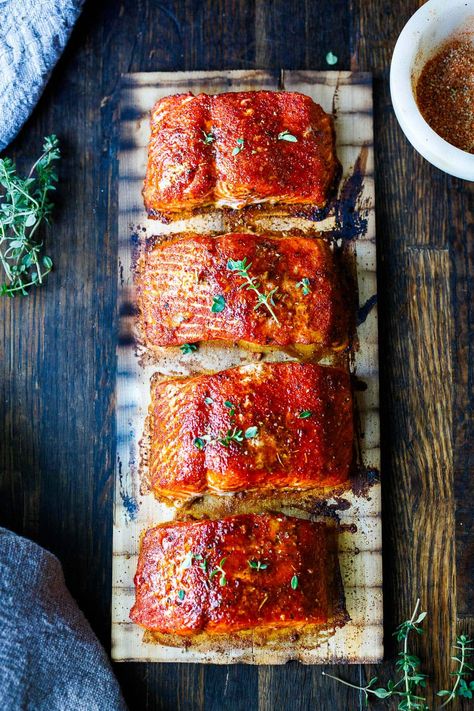 This recipe for Cedar Plank Salmon couldn't be any easier! Infuse wild salmon with subtle smoke and our flavorful Northwest Salmon Rub, using a cedar plank on the grill. No fuss with easy clean up. Salmon Calories, Salmon Rub, Cooking Salmon Fillet, Diy Seasonings, Grilled Salmon Salad, Best Salmon Recipe, Meatless Mains, Feasting At Home, Delicious Salmon Recipes