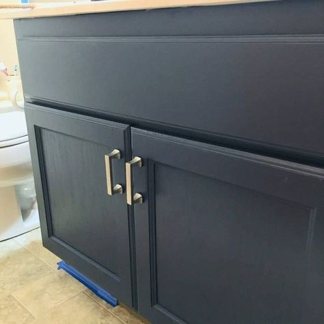 Midnight navy blue bathroom vanity DIY from Rust-Oleum furniture Transformations Rust Oleum Cabinet Transformations, Navy Blue Bathroom Vanity, Bathroom Vanity Diy, Rustoleum Cabinet Transformation, Rustoleum Cabinet, Navy Blue Bathroom, Chalk Paint Cabinets, Rustoleum Chalk Paint, Sea Bathroom