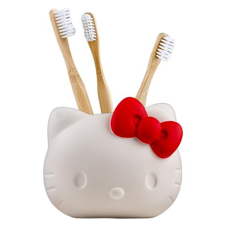 PRICES MAY VARY. 100% Polyresin ITEM INCLUDES: One Hello Kitty toothbrush holder measuring 4.5" x 4.5", fabricated from poly resin with a matte finish, perfect for adding a cute and charming touch to your bathroom décor. VERSATILE USE: Ideal for holding toothbrushes, makeup brushes, pens, and other small items, this Hello Kitty holder adds a cute and charming touch to your space. Its durable poly resin construction and compact size make it perfect for any countertop, dresser, or desk, keeping yo Hello Kitty Deodorant, Bathroom Decor Hello Kitty, Hello Kitty Claw Clip, Cute Bathroom Accessories, Hello Kitty Stuff Accessories, Amazon Girly Finds, Wishlist Affordable, Hello Kitty Home Decor, Hello Kitty Things To Buy