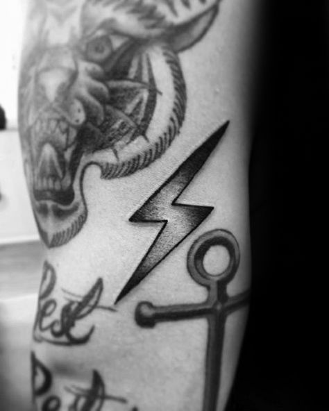 Guys Filler Shaded Lighting Bolt Arm Tattoo Deisgns Lightning Tattoo Traditional, Lightning Bolt Tattoo Men, Small Filler Tattoo Ideas Men, Lighting Bolts Tattoos, Old School Filler Tattoo, Filler Tattoos For Men, Small Gap Filler Tattoo, Sleeve Gap Fillers Tattoo Ideas, Fill In Tattoos