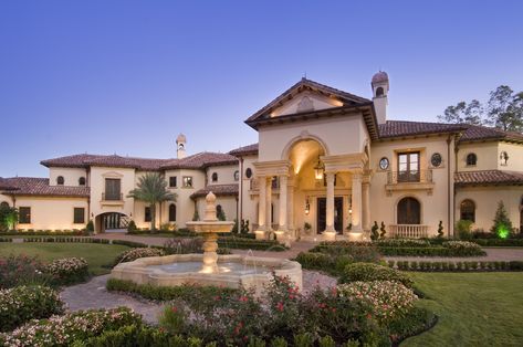 Adding a fountain to your home's entrance makes a classy first impression. With a walkway encircling the feature, your guests are sure to be impressed before they even enter the building. Check out this photo from our portfolio that showcases the value of an entrance fountain. #fountains #outdoors #frontyard #customhome #luxuryhome #luxuryliving #designinspo #homedesign #houstonb Mediterranean Mansion, Mediterranean Architecture, Mediterranean Style Homes, Mega Mansions, Mediterranean Home Decor, Rich Home, Mansions For Sale, Traditional Exterior, Mansions Luxury