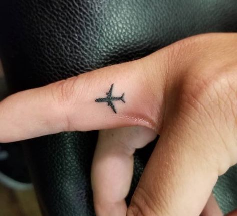 Airplane Tattoo On Finger, Plane Finger Tattoo, Airplane Micro Tattoo, Airplane Wing Tattoo, Fine Line Finger Tattoo Ideas, Aviation Tattoo Ideas, Airline Tattoo, Pilot Tattoo Aviation, Jet Plane Tattoo