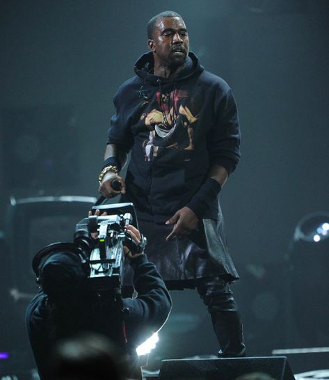 Kanye West made headlines when he rocked a leather skirt a few years ago. | 33 Men Rocking Skirts Pyrex Vision, Harry Styles Concert Outfit, Concert Outfit Rock, Guys In Skirts, Kanye West Style, Men Wearing Skirts, Punk Men, Harry Styles Concert, Wedding Outfit Men