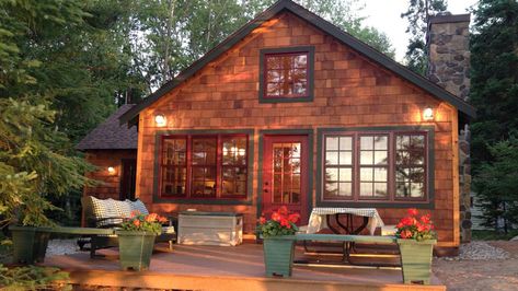 This lakefront cabin in Wisconin began life in 1935 as a one-room structure. Four owners and several haphazard additions and renovations later, the cabin was 860 square-feet of issues related to mismatched roof lines and a crumbling foundation. Enter Dale and Terrie Pohjola--the cabin's new owners who delivered its greatest (and smartest) renovation yet. See the before and after of this cabin renovation here. Cabin Renovation Before And After, One Room Cabins, One Room Cabin, Cabin Renovation, Lakeside Cabin, Cabin Exterior, Christmas Cottage, Cottage Exterior, Cedar Siding