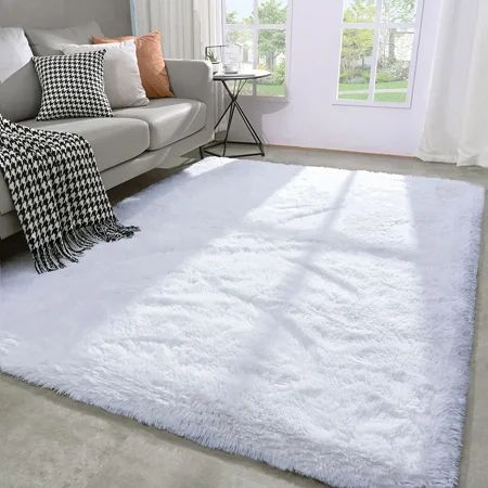 Lochas Fluffy Rug Soft Fuzzy Shag Carpet for Bedroom Living Room Indoor Home Decor Nursery Solid Print Big Area Rugs, 5'X8',White Lochas Area Rug has the capability to brighten any room with a luxurious and lively pop of color. In addition, the fluffiness will make any space feel comfortable and provide it with warmth. After a busy day, rug can make your feet feel soft, keep your feet off the cold ground, and give you the feeling of walking on clouds. The rug also acts as a muffler, filling your White Rug Bedroom Aesthetic, Rug Ideas For Bedrooms, Big Rugs Bedroom, White Fluffy Carpet, White Rug Bedroom, Blue Grey Living Room, Big Area Rugs, Bedroom Carpets, Big Rug