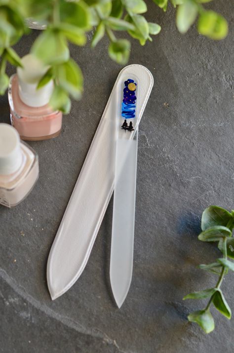 glass nail file hand painted with dark pine trees and a moon and stars Glass Manicure, Girl Tools, Resin Jewelry Tutorial, Floral Meadow, Hand Painted Designs, Glass Nail File, Glass Nail, Tempe Az, Painted Designs