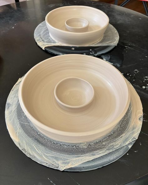 Chip & dip bowls! Thinking ahead to entertainment season 🎃👻🍂🍁🎄🤶🎉This is my first stab at chip & dip bowls. I’m debating whether I should flute the edges or keep as is. #chipsanddip, #bowls, #largebowls, #ceramicartist, #ceramicbowls, #entertaining, #pottery, #potteryoninstagram, #shallowdish, #smallbatchpottery, #smallbusiness Ceramics Chip And Dip Bowl, Chip Dip Bowl Pottery, Snack Bowls Ceramic, Ceramic Chip And Dip Platters, Chip And Dip Bowl Pottery, Pottery Chip And Dip Bowl, Dip Bowl Ideas, Holiday Ceramics, Ceramic Wheel