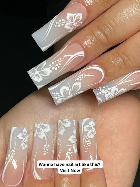 White nails are a classic winter nail color that is sleek and sophisticated. Try a sheer white for a minimalist look or go for a bold white for a more dramatic White Nails For Winter, Hibiscus Nail Art, Nails For Winter, Hawaiian Nails, Hawaii Nails, Acrylic Nail Designs Coffin, Cruise Nails, White Hibiscus, Diy Acrylic Nails