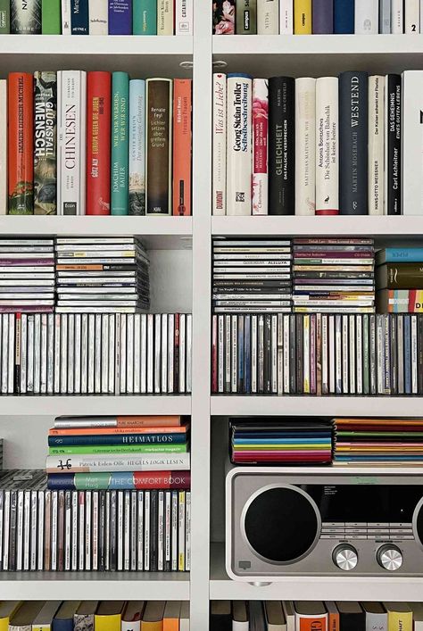 From floating shelves to built-in drawers to displaying CDs like art, here are 10 CD storage ideas to help bring style and function to your prized musical possessions. #cdstorageideas #vinylstorageideas #cleanhouse #cleaningguide #cleaninghacks #cleaningtips  #stepbystepcleaning #thespruce How To Display Cds, Cd Storage Ideas Diy, Dvd Display Ideas, Cd Shelf Ideas, Cd Organization Ideas, Cd Display Ideas, Cds Storage, Sally House, Cd Storage Ideas