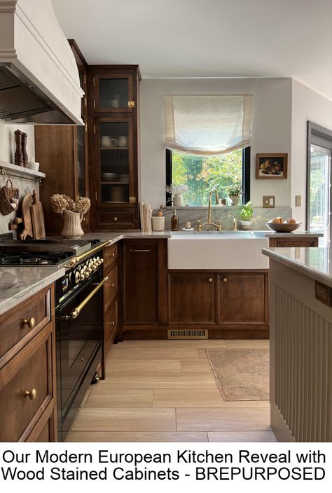 It feels so good to finally be writing this post! Our modern European inspired kitchen is DONE and I get to share all the beautiful photos and details with you today. A kitchen renovation takes a lot out of you. Removing the room that is the heart of the home disrupts your day to day #farmhousekitchen Wood Stained Cabinets, Dark Oak Kitchen Cabinets, Modern European Kitchen, Walnut Kitchen Cabinets, Trendy Kitchen Design, Stained Cabinets, Dark Wood Kitchen Cabinets, European Kitchen, Brown Kitchen Cabinets