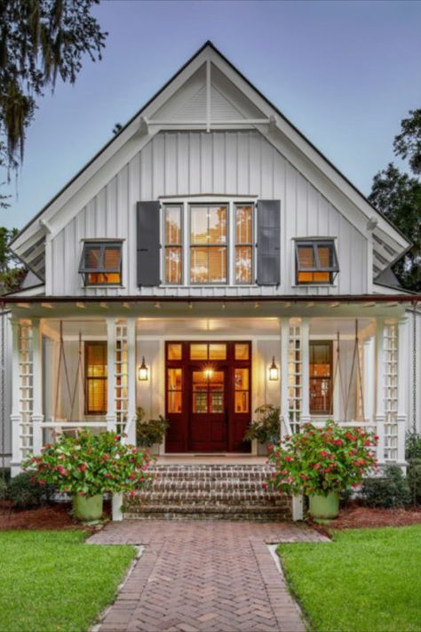 Today, we’re taking a tour of this gem in Palmetto Bluff, a recently sold 3,045 sqft, 3 bed, 3.5 bath home. Designed by Historical Concepts, this house captures the Lowcountry’s unique design aesthetic with its charming shutters and classic Lowcountry metal roof. It also does a wonderful job of showcasing the best of what village living offers in coastal South Carolina! Farmhouse Curb Appeal, Lowcountry Farmhouse, Palmetto Bluff Homes, Craftsman Bungalow House Plans, Houses By The Beach, Historical Concepts, Cottage Porch, South Carolina Homes, Palmetto Bluff