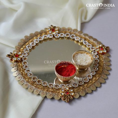 The pooja platters from Crasto India blend tradition and elegance, perfect for enhancing your spiritual rituals. Explore a range of beautifully crafted designs that add a touch of grace to your ceremony! Shop now Rakshabandhan Thali Decoration, Karwa Chauth Gift, Arti Thali Decoration, Akshay Tritiya, Chaturthi Decoration, Aarti Thali, Ganesh Chaturthi Decoration, Thali Decoration, Thali Decoration Ideas