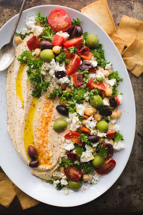 This Loaded Hummus is a great crowd-pleasing appetizer, but the hummus recipe itself is a keeper! Make this regularly and keep a container in the fridge! It's great for snacking, lunches and dinners. Naturally vegan and gluten-free. From @tasteLUVnourish Loaded Hummus, Sommer Mad, Fest Mad, Crowd Pleasing Appetizers, Summer Appetizer, Hummus Recipe, Makanan Diet, Deilig Mat, Clean Eating Snacks